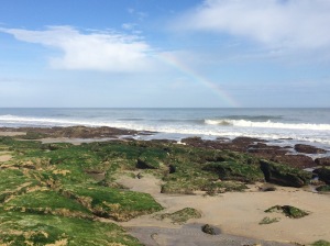 Outcroppings at low tide, Fort Fisher, just north of the rock revetment. Check out the rainbow...